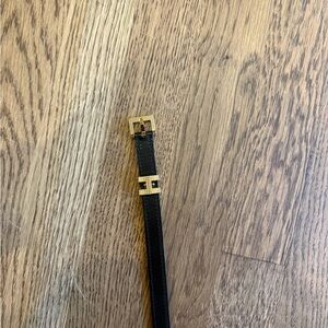 Hermes Elegant Black Leather Belt with Gold Buckle